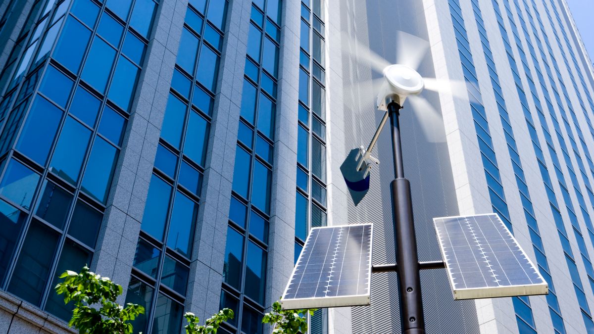 A solar powered light in front of a building